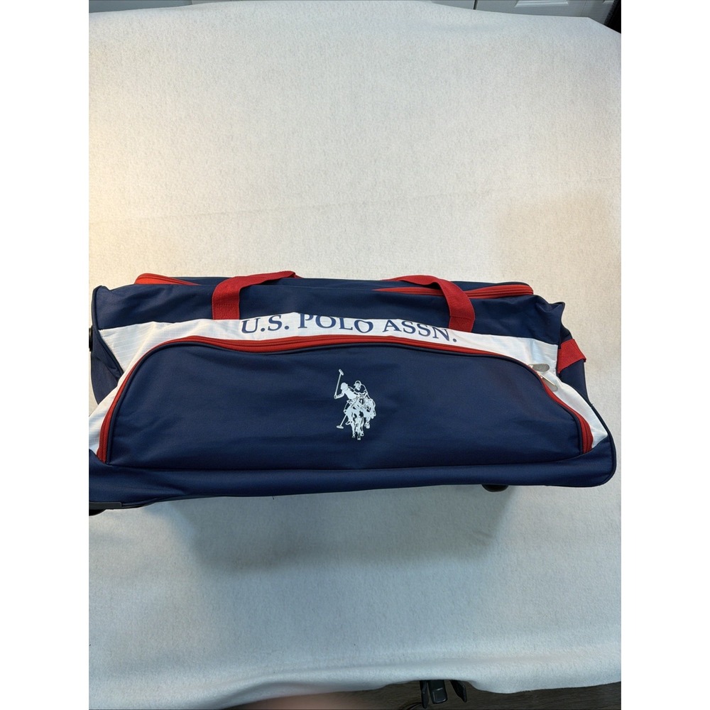 USPolo ASSN Red White And Blue Duffel Bag With Wheels And Handle
